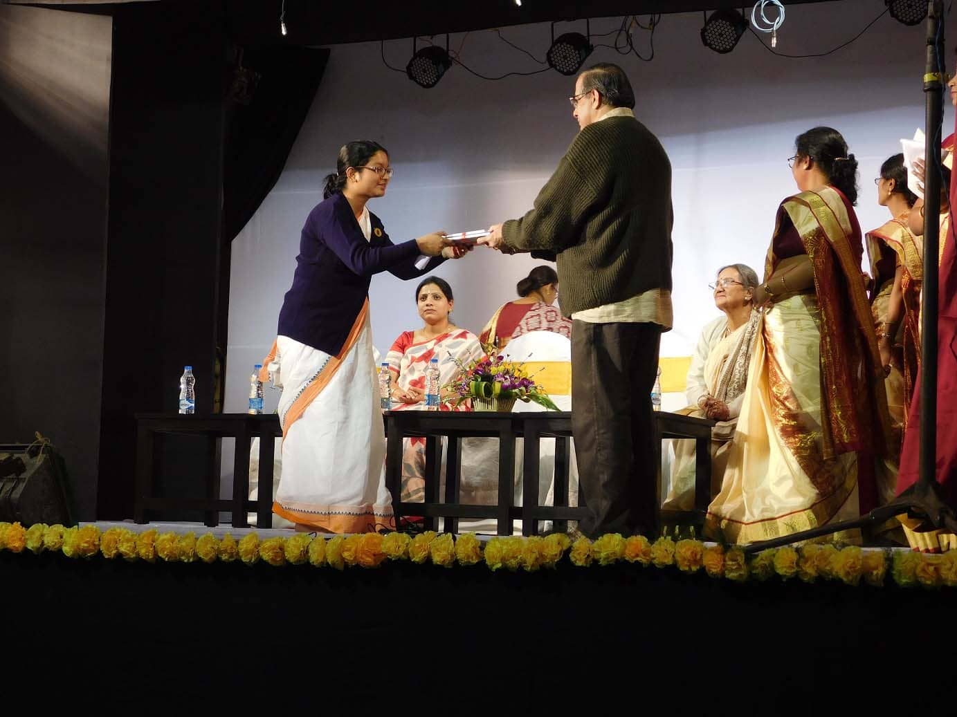 Students receiving awards at school event